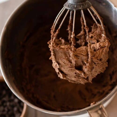 dairy free chocolate frosting on a whisk