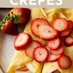 gluten free crepes on a plate with strawberries