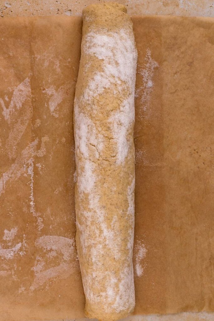 cinnamon rolls dough rolled into a log