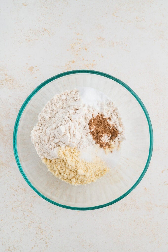 Gluten free chocolate chip cookies dry ingredients in a glass bowl.