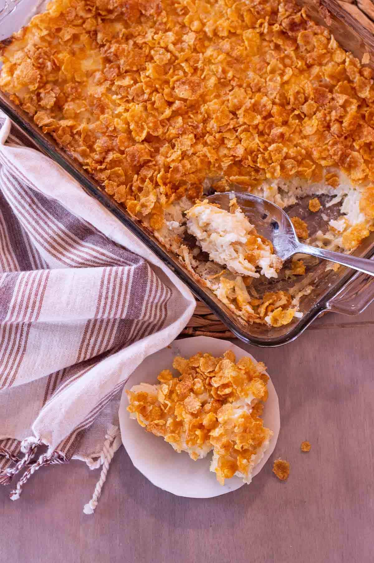 funeral potatoes in a pan and on a plate