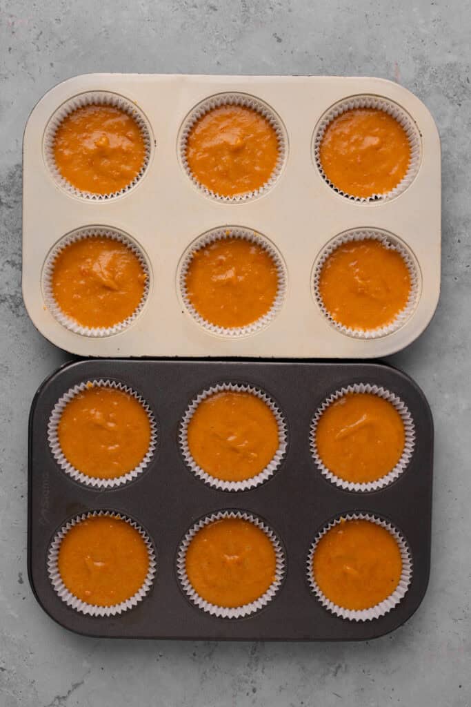 Gluten free pumpkin cupcakes in the cupcake pan un baked
