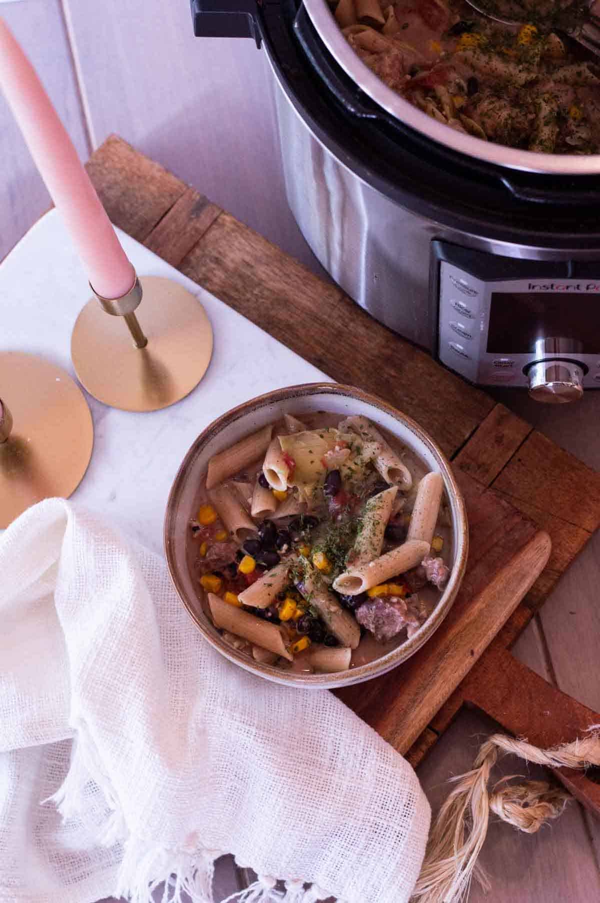 pulled pork pasta in a pot and bowl