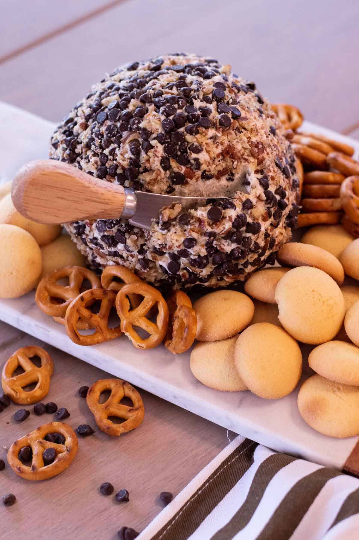 Chocolate Chip Cheeseball on a marble tray