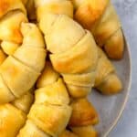 Plate of golden brown gluten-free crescent rolls