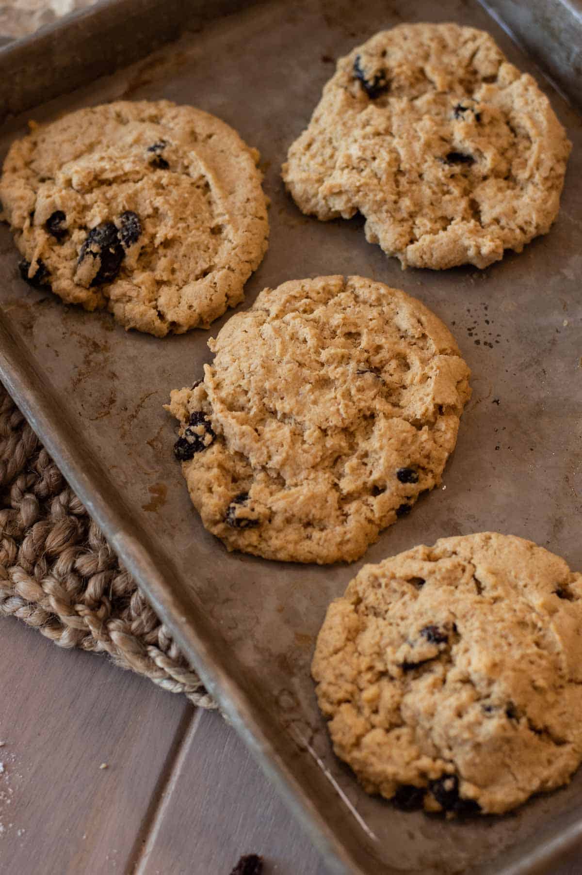 Vegan Oatmeal Raisin Cookies on a baking sheet