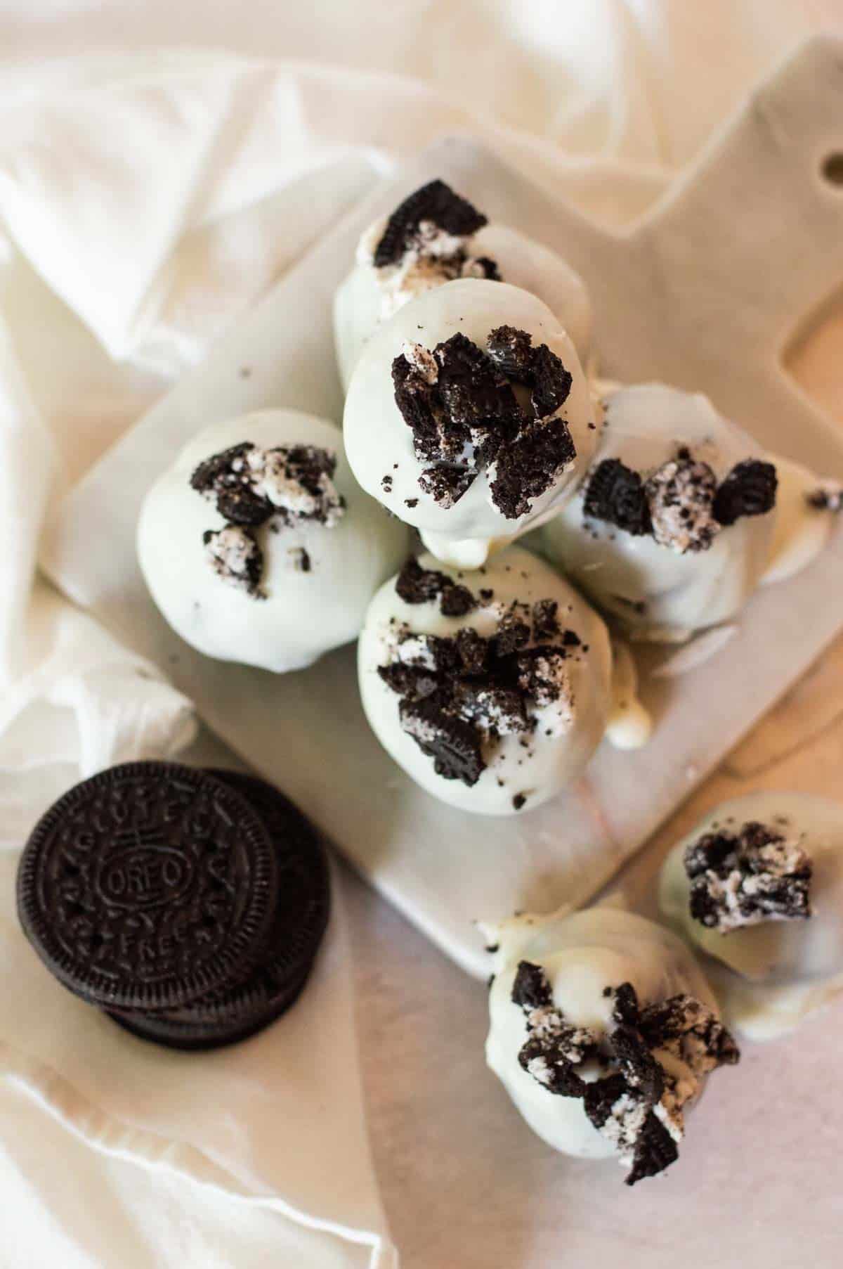 Gluten Free Oreo Balls on a marble plate