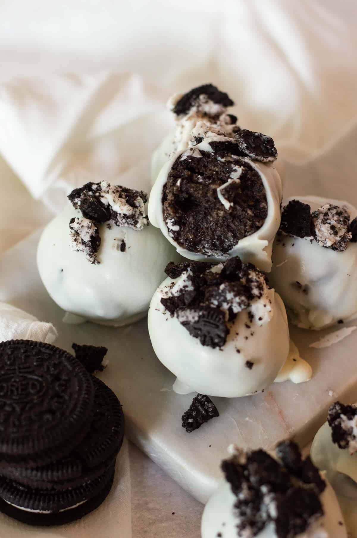 gluten free Oreo balls on a marble tray