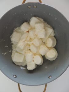 Christmas popcorn step by step instructions marshmallows in a pan