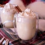 Non Alcoholic Eggnog Recipe in a glass cup with a cinnamon stick