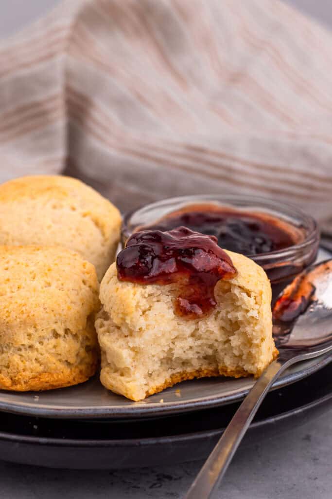 Gluten Free Buttermilk Biscuits on a plate with jam