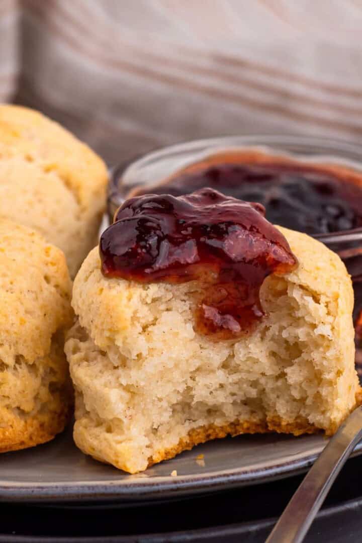 Gluten Free Buttermilk Biscuits on a plate with jam