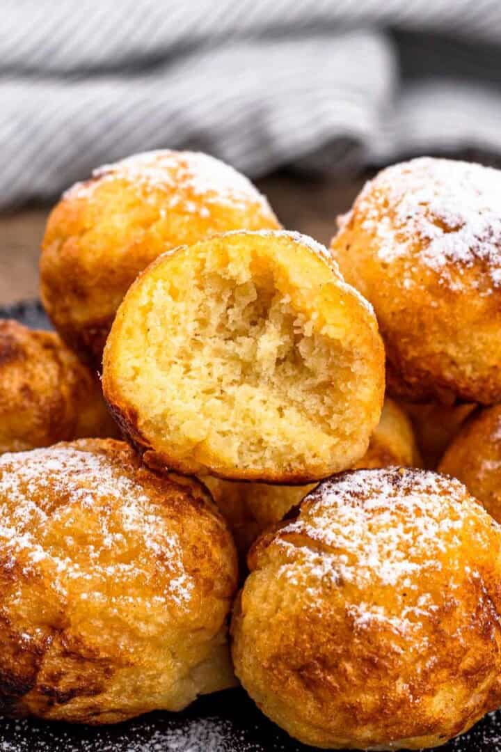 authentic Ebelskiver recipe on a plate with powdered sugar