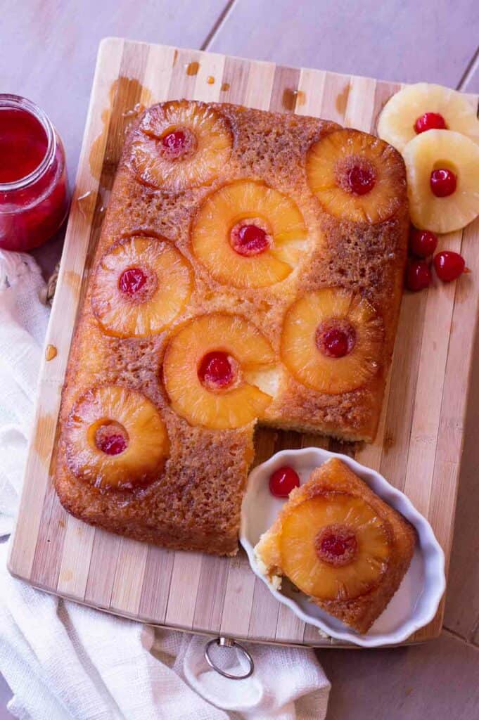 Gluten free pineapple upside down cake with pineapple rings and maraschino cherries