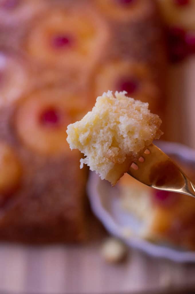 Gluten free pineapple upside down cake with pineapple rings and maraschino cherries