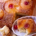 Gluten free pineapple upside down cake with pineapple rings and maraschino cherries