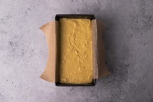Gluten Free Lemon Drizzle Cake in a loaf pan