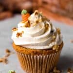 Gluten Free Carrot Cake Cupcakes with frosting, walnuts and tiny carrots