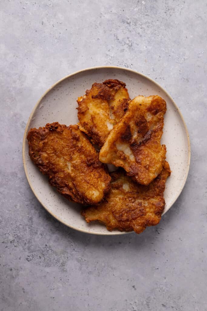 Restaurant Style Gluten Free Fish and Chips fried on a plate