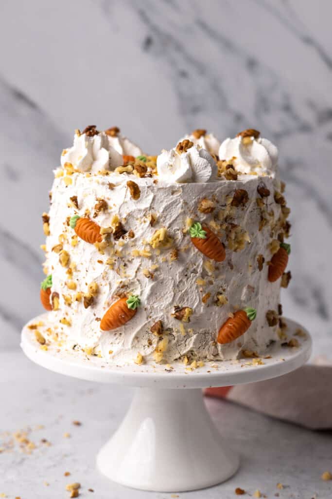 The BEST Gluten Free Carrot Cake on a cake stand