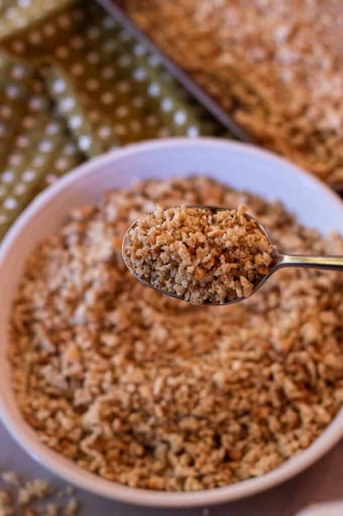 Gluten Free Breadcrumbs in a bowl and on a spoon