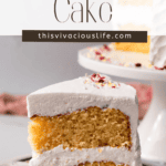 slice of Gluten free cake on a plate with vanilla buttercream frosting in between the cake layers