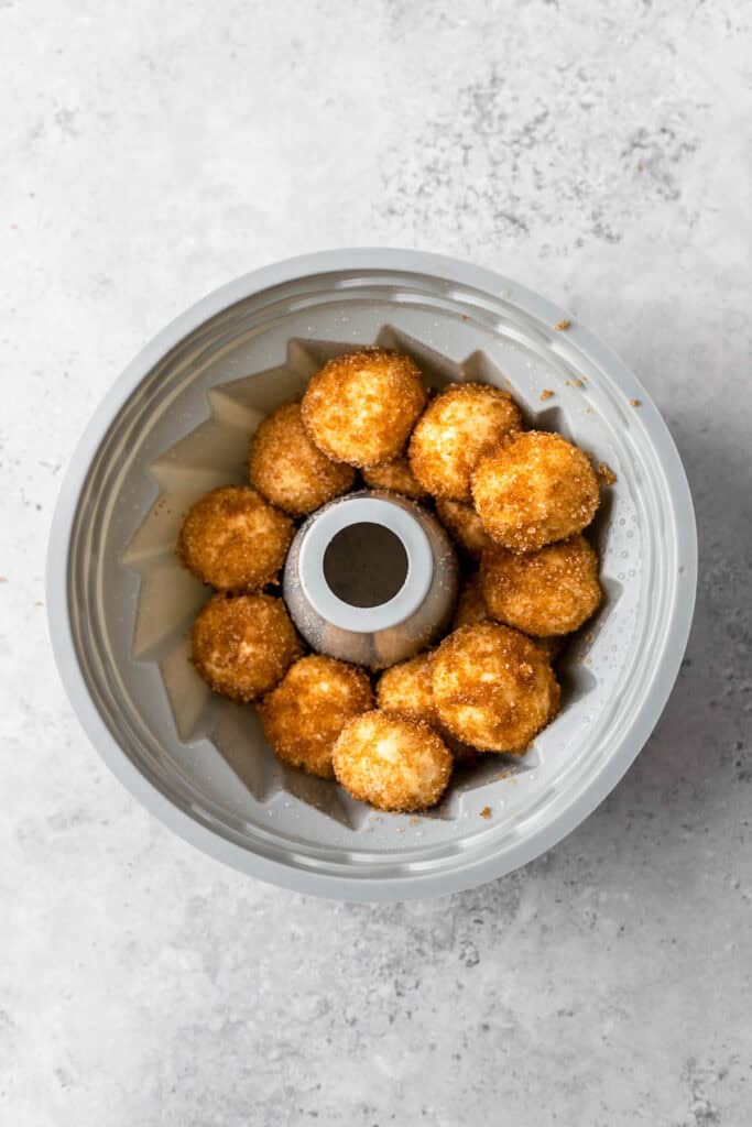 Soft Gluten Free Monkey Bread dough balls in bundt pan