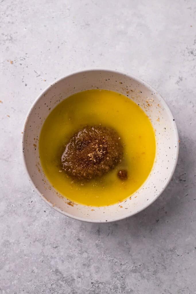 Soft Gluten Free Monkey Bread caramel topping ingredients in a bowl