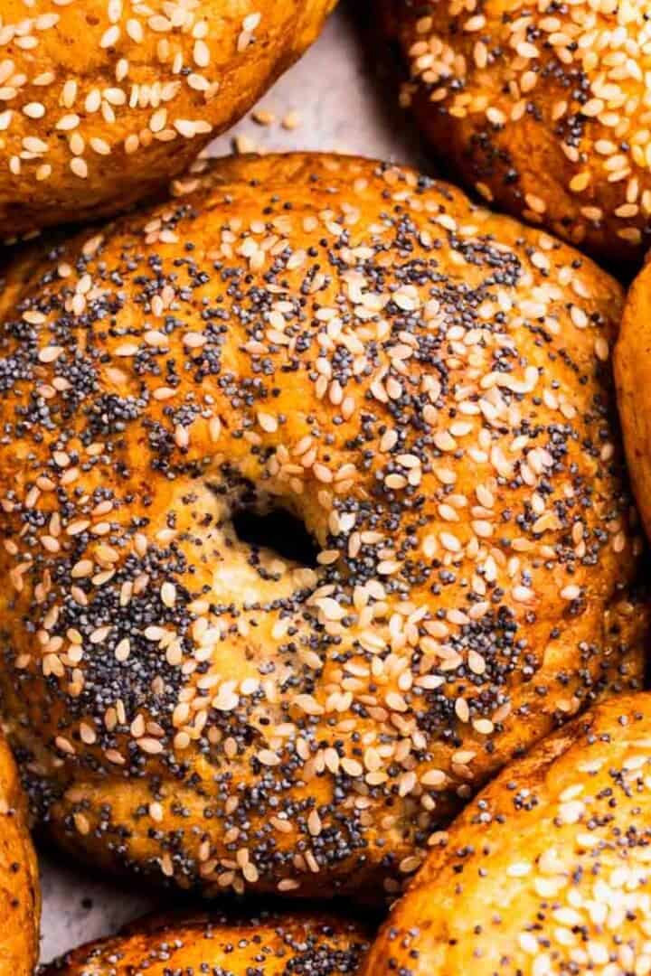 Gluten Free Bagels all next to each other some with seeds