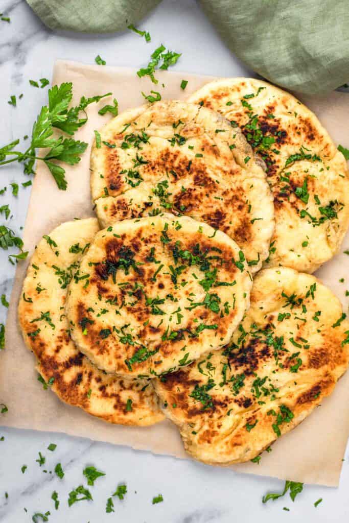 Top down view of gluten free naan bread on a plate