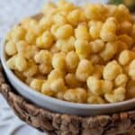 sugared Corn Pops in a white bowl
