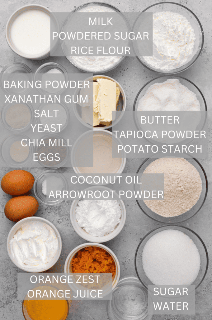 ingredients for soft and yeasty gluten free orange knots on a grey table with titles over each ingredient 