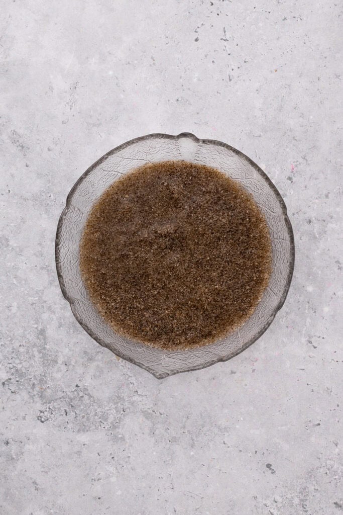 Chia seeds with water in a bowl to create a gelatin like texture