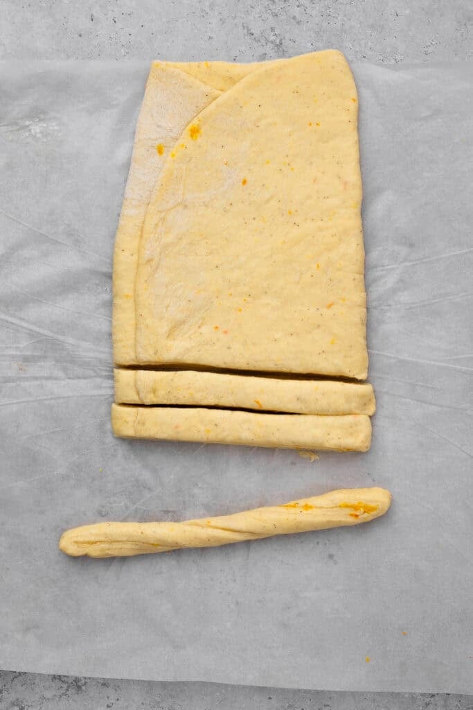 sliced dough then twisted to make a breadstick of sorts