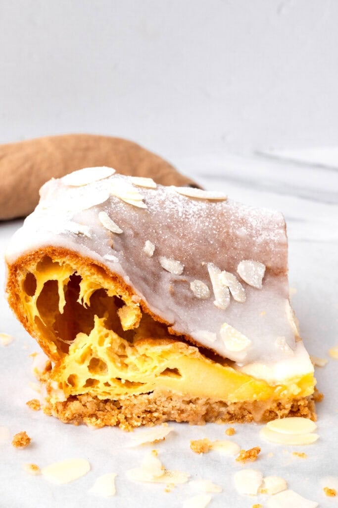 Slice of gluten free danish cut from the side to show airy texture
