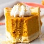 Grandma's Gluten Free Pumpkin Pie with a bite taken out of the slice