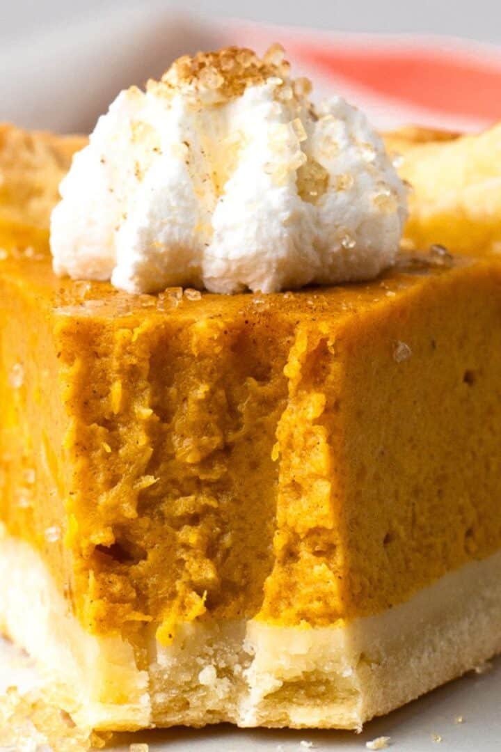 Grandma's Gluten Free Pumpkin Pie with a bite taken out of the slice