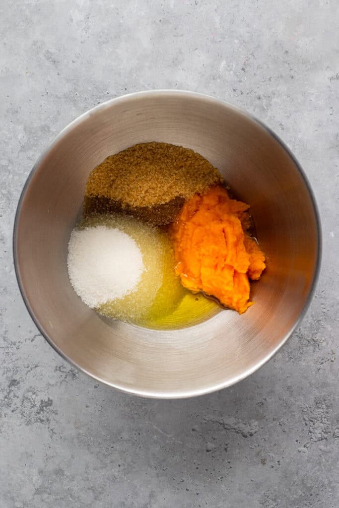 Soft Gluten Free Pumpkin Cookies with Chocolate Chips wet ingredients in a bowl