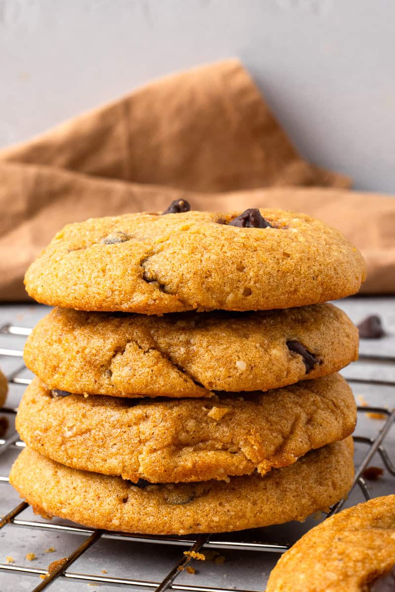 Soft Gluten Free Pumpkin Cookies with Chocolate Chips stacked on top of each other