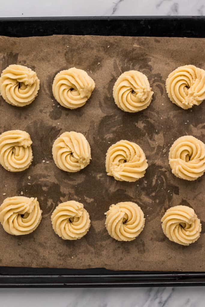 30-Minute Danish Gluten Free Butter Cookies on a tray after being baked