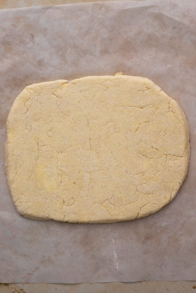 gluten free buttermilk biscuit dough rolled into a rectangle